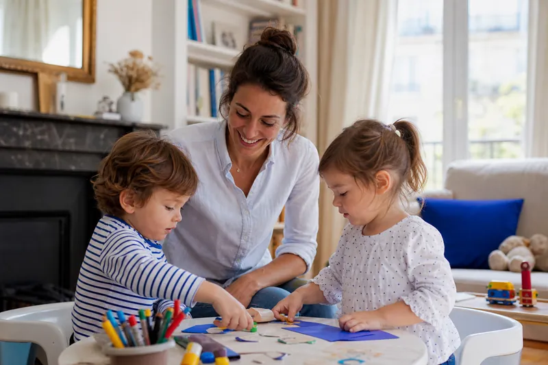 Trusted childcare provider meeting a family at home